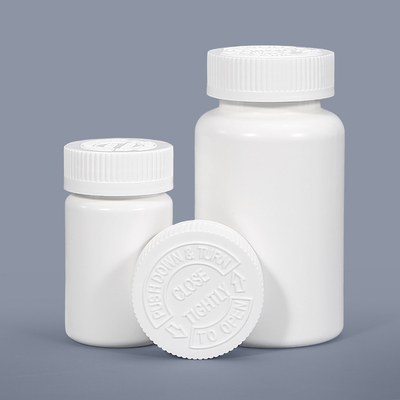 Bouteilles en plastique rondes blanches gravées pour comprimés en capsules