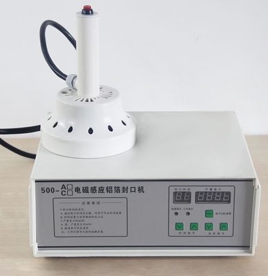 Machine de scellement par induction électromagnétique portative semi-automatique pour feuille d'aluminium