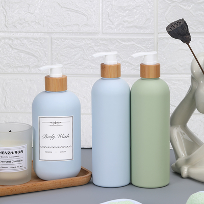 Bouteille de shampooing avec couvercle en bambou en HDPE en plastique à contact doux et contenant de la lotion pour le corps vide